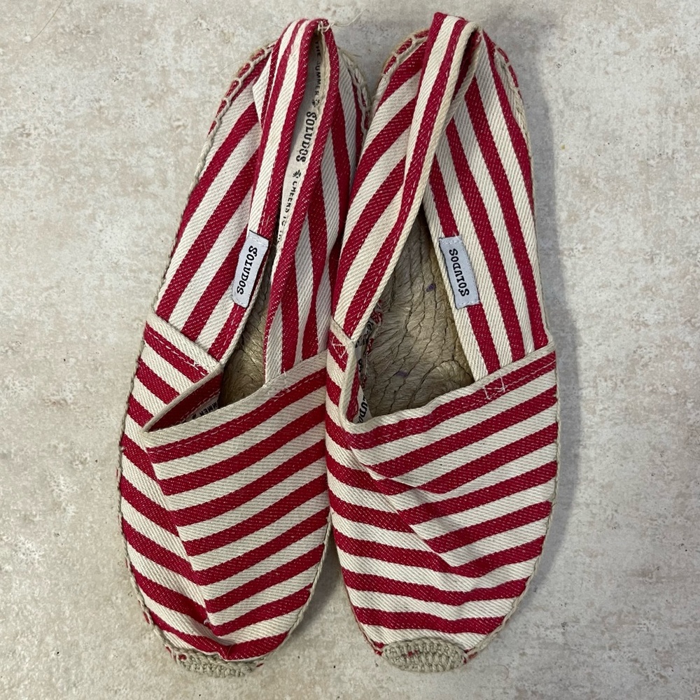 Red and white Saludos flats
